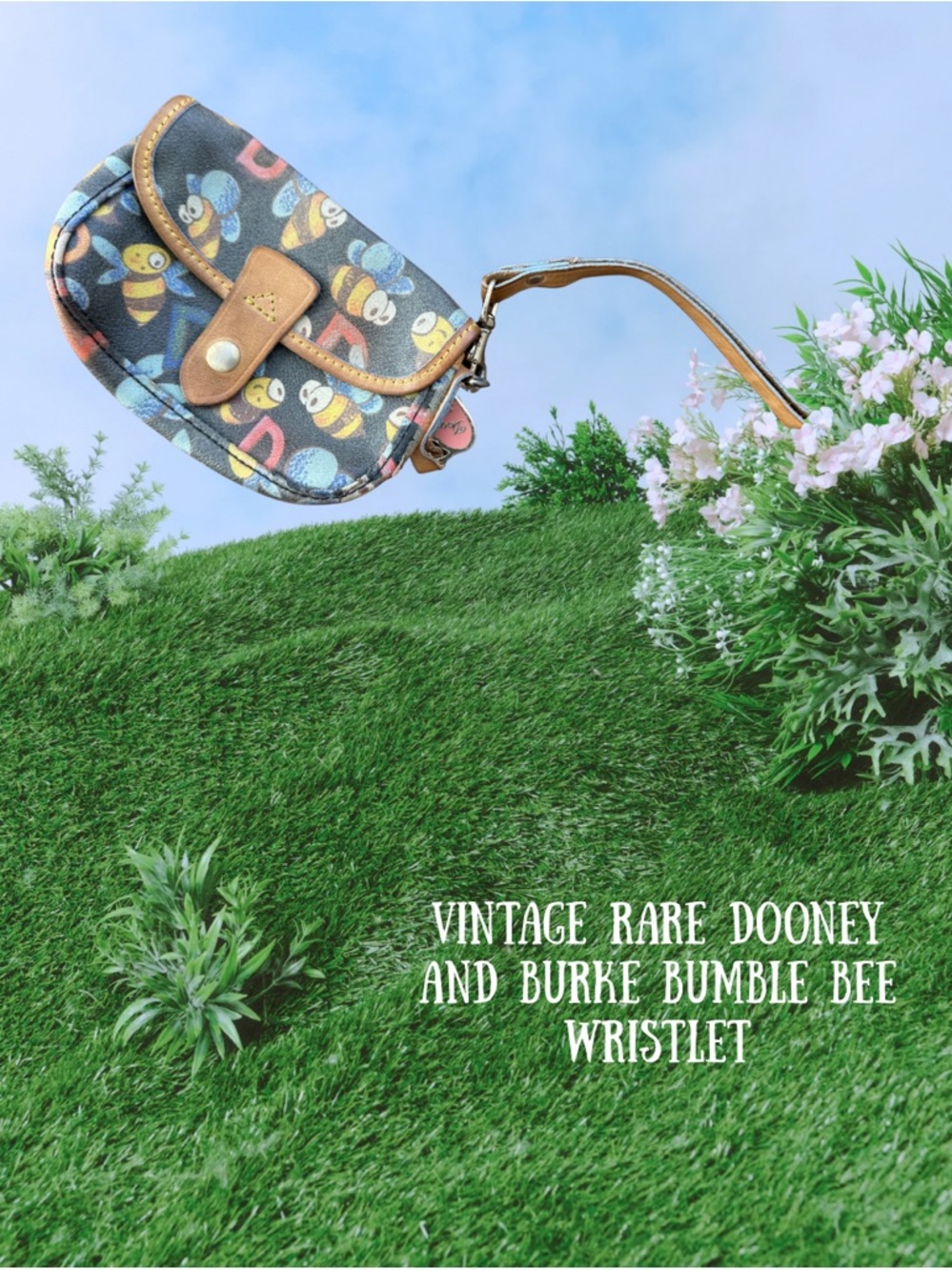 Dooney & Bourke Black Bumble Bee Print Wristlet with Tan Trim